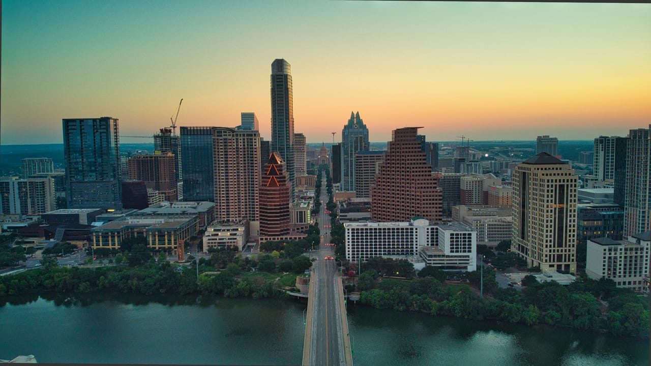 Congress Avenue at sunset from the air, looking towards the Texas State Capitol